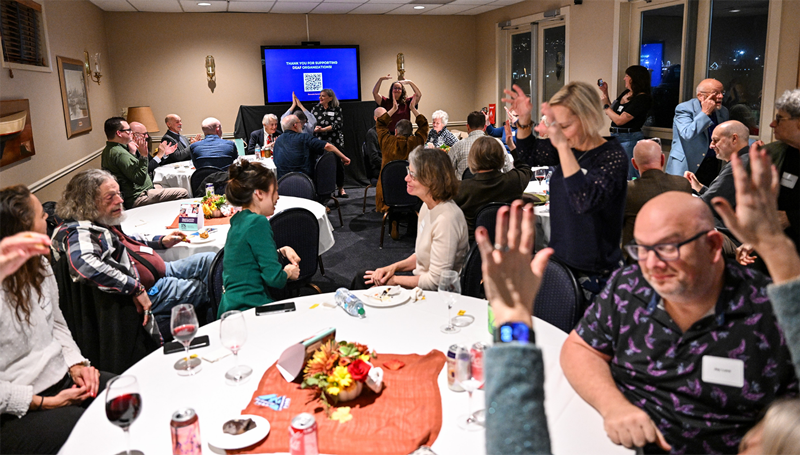 Gathering of people at an Deaf Organizations fund event.